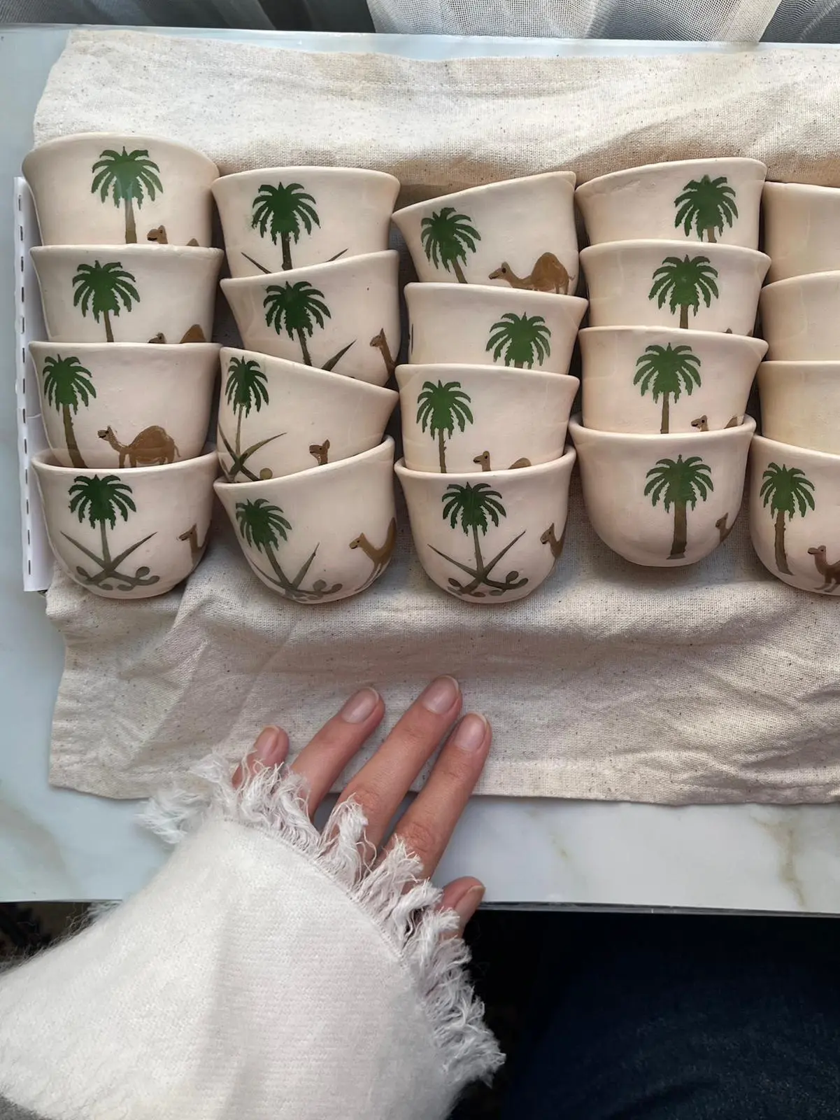 Duha Khaled, founder of Duha Ceramic, at her wheel in Mersin